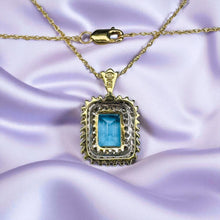Load image into Gallery viewer, Blue Topaz Diamond Double Halo Necklace - 10K Yellow Gold Emerald Cut Swiss Blue Topaz - 18 Inch Chain December Birthstone Fine Jewelry