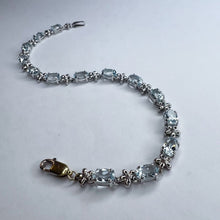 Load image into Gallery viewer, 10k White Gold 5 CT T.W. Aquamarine Tennis Bracelet 7.15&quot; Flower Bracelet 5.7g
